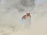Dust pollution reaches an alarming stage in Dhaka and many deaths as well as several million cases of illness occur every year due to the poor air quality, Dhaka, Bangladesh
